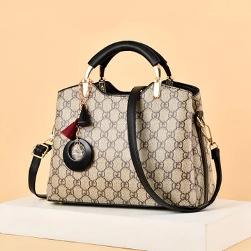 MBC közepes méretű női kézitáska bézs aprómintás fekete füllel aa-001827